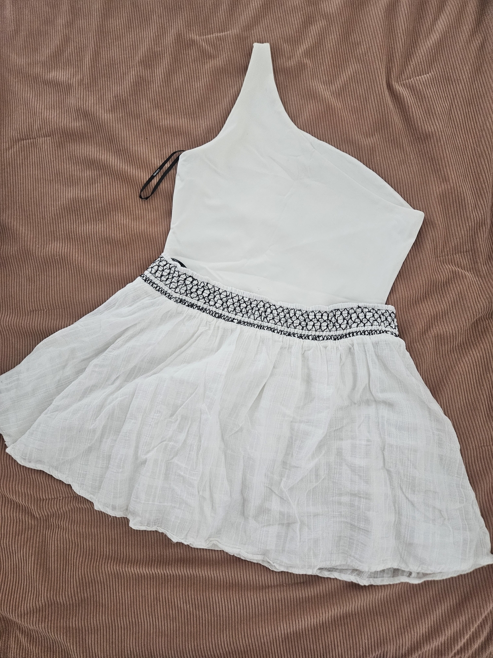 Others Follow White One-Shoulder Mini Skirt with Black Embroidered Waist